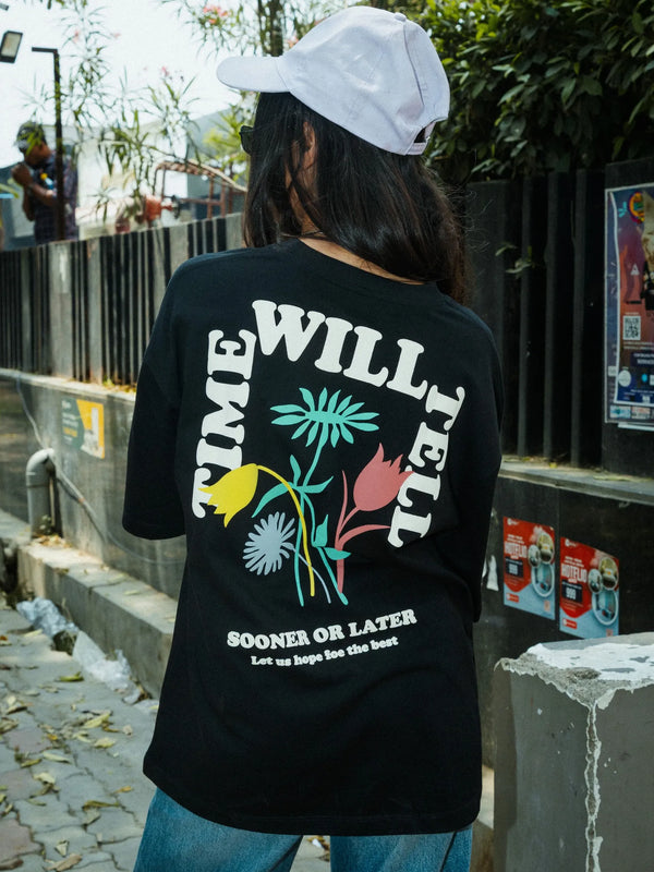 Women Oversized Black T-Shirt with “Time Will Tell” & Floral Graphic Print