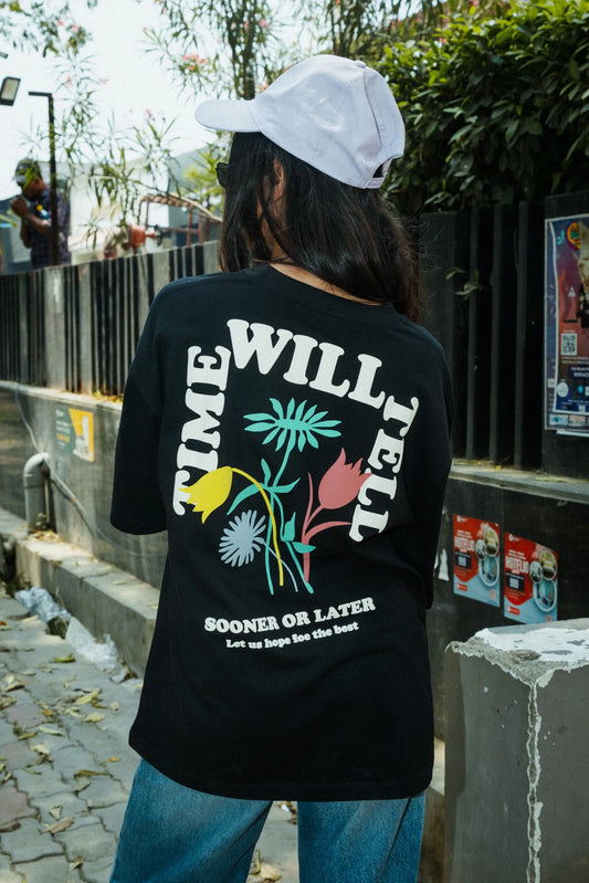 Women Oversized Black T-Shirt with “Time Will Tell” & Floral Graphic Print