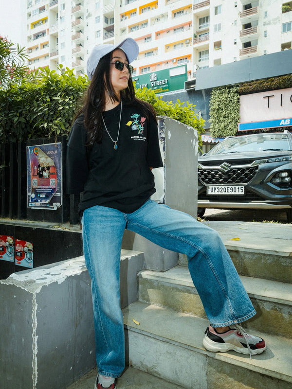 Women Oversized Black T-Shirt with “Time Will Tell” & Floral Graphic Print