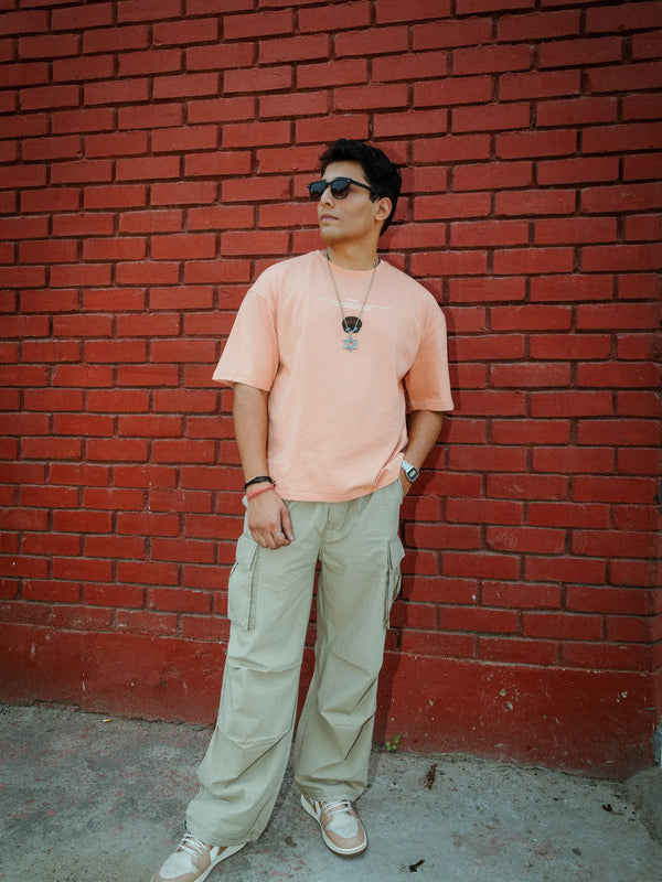 Unisex Oversized Peach Cotton T-Shirt with Back Cartoon Graphic