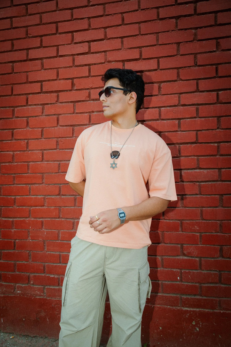 Unisex Oversized Peach Cotton T-Shirt with Back Cartoon Graphic
