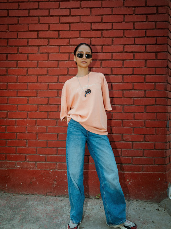 Women Oversized Peach Cotton T-Shirt with Back Cartoon Graphic