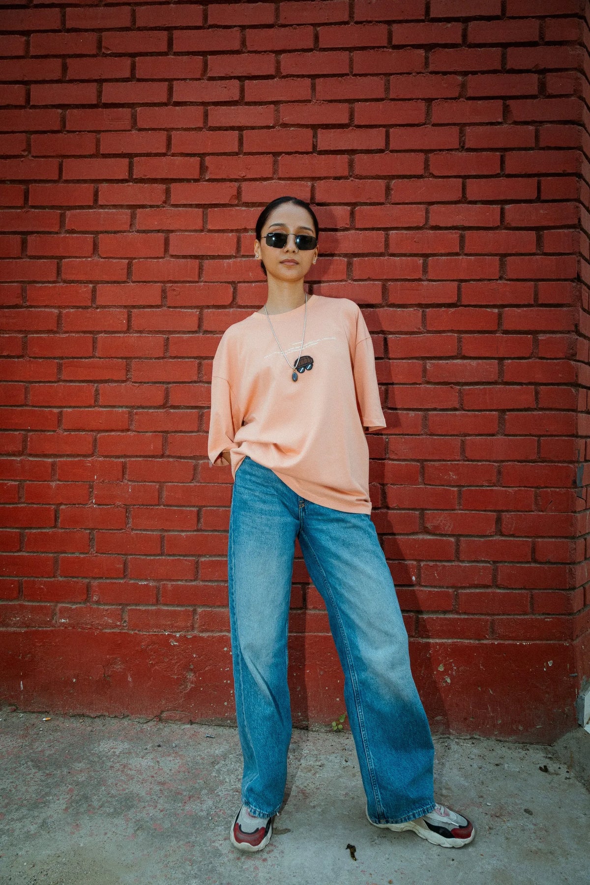 Women Oversized Peach Cotton T-Shirt with Back Cartoon Graphic