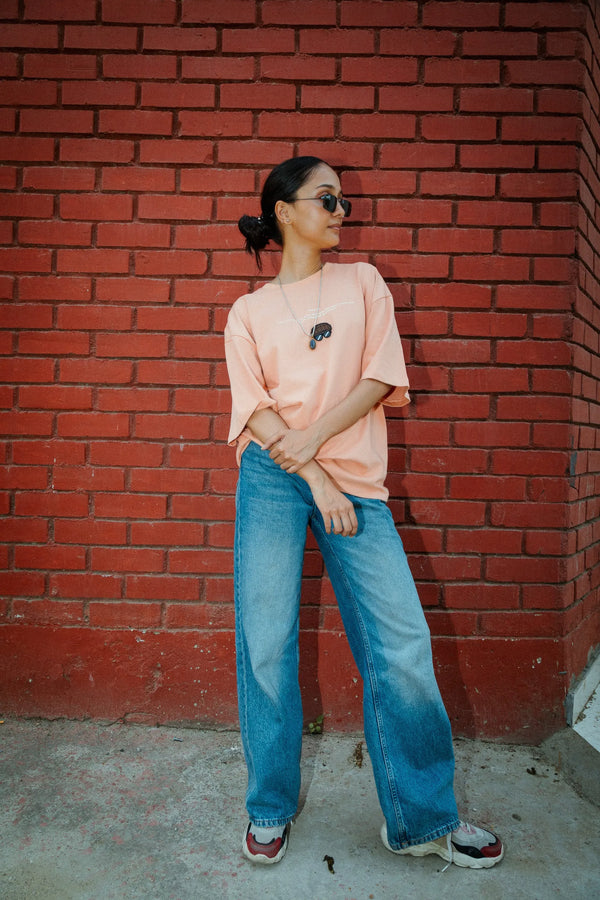Women Oversized Peach Cotton T-Shirt with Back Cartoon Graphic