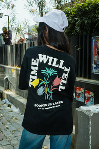 Women Oversized Black T-Shirt with “Time Will Tell” & Floral Graphic Print