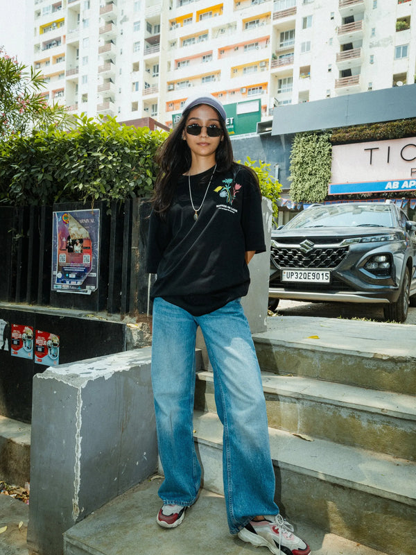 Women Oversized Black T-Shirt with “Time Will Tell” & Floral Graphic Print