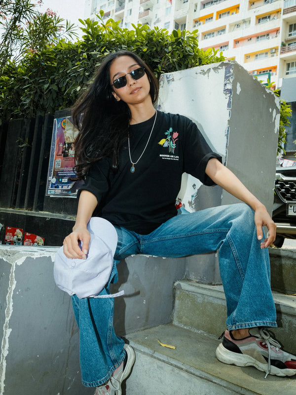 Women Oversized Black T-Shirt with “Time Will Tell” & Floral Graphic Print