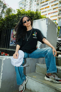 Women Oversized Black T-Shirt with “Time Will Tell” & Floral Graphic Print