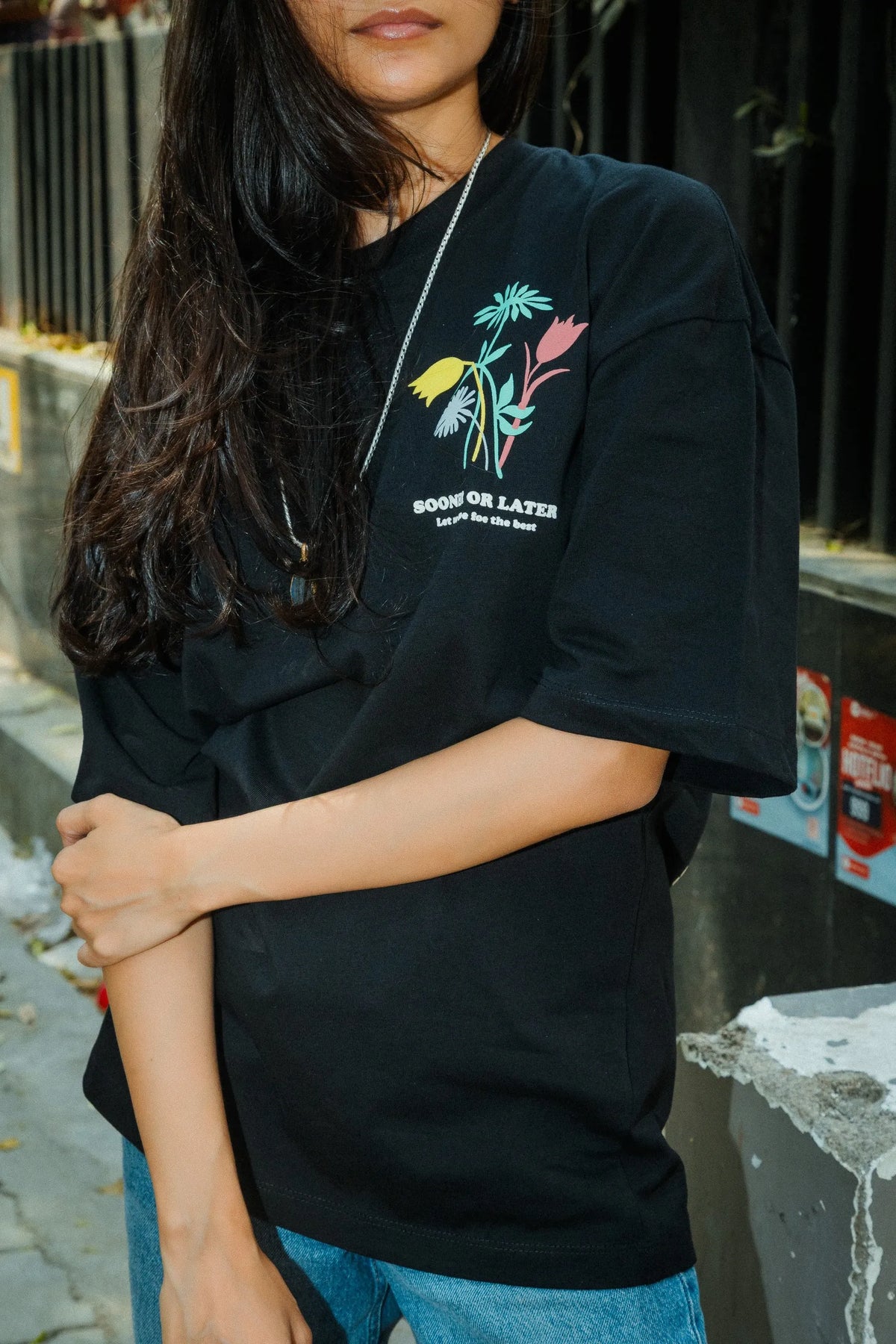 Women Oversized Black T-Shirt with “Time Will Tell” & Floral Graphic Print