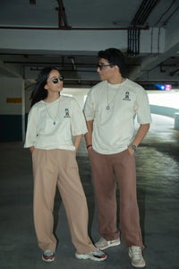 Women Oversized Off-White T-Shirt with Typographic Print