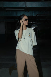 Women Oversized Off-White T-Shirt with Typographic Print