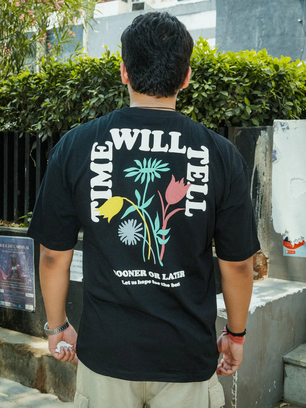 Unisex Oversized Black T-Shirt with “Time Will Tell” & Floral Graphic Print