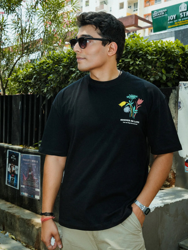 Unisex Oversized Black T-Shirt with “Time Will Tell” & Floral Graphic Print