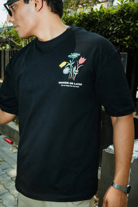 Unisex Oversized Black T-Shirt with “Time Will Tell” & Floral Graphic Print